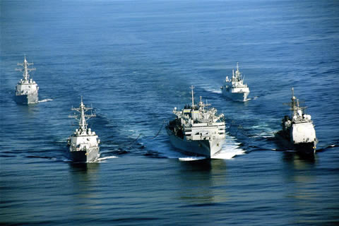HMCS Calgary, top right, sails with ships from the USS Abraham Lincoln Carrier Strike Group.

