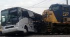'Train just kept coming' toward bus on tracks, passenger says