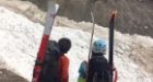 Skiers get up close with an avalanche in the Rocky Mountains