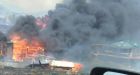 Wildfire near Ashcroft, B.C., consumes buildings, prompting evacuations and highway closures