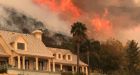 Residents flee as wildfire nears wealthy California enclave