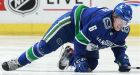 Canucks' Brock Boeser leaves game against Flames with foot injury