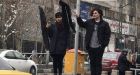 Iranian woman 'sentenced to 20 years in prison' for removing headscarf in protest