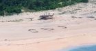 Giant SOS on Pacific island leads to rescue of stranded sailors