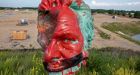 The head of the statue of Egerton Ryerson now on a spike at Land Back Lane in Caledonia, Ont. | CBC News