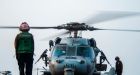 U.S. navy says drone strike hit oil tanker off Oman, killing 2, as Israeli officials blame Iran