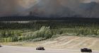 Power being restored to Jasper, Alta., as weather offers respite in wildfire battle