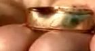 Wedding ring saves life of man whose antiques shop was being robbed