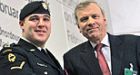 Canadian soldier accepts NATO peace medal