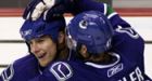 Isbister lifts Canucks to key win over Blues