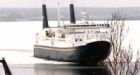 Ice-jammed ferry breaks free, with a little help