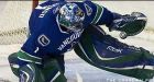 Canucks cool off Oilers; move into 6th