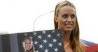 U.S. nude swimmer defies ban on animal rights protest