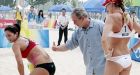 Bush works up a sweat getting to know the women's volleyball team