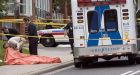 Man slain at busy bus stop
