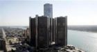 GM shares rebound after Detroit merger reports