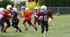 Parents allege racial slurs at 12-year-olds' football game
