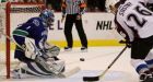 Canucks' Luongo sets record in shootout loss