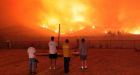 Calmer winds help tame California wildfires