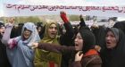 Afghan women pelted with stones during rape law protest