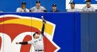 Halladay pitches one-hitter to beat Yankees