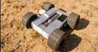 Military robot 'hops' over walls