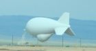 Giant white blimp has Kandahar on edge