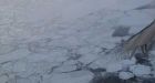 Nunavut ice-floe rescuers stuck in boat