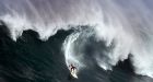 Hawaii holds rare surfing contest as 12m waves roll in
