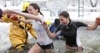 Polar bear dippers start 2010 with icy plunge