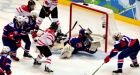 Canada romps in women's hockey opener