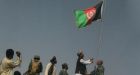 Afghan army raises national flag over embattled Taliban town at the heart of NATO assault