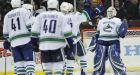 Grabner nets hat trick, Canucks clinch playoff spot