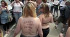 Dozens of topless women march for equality in Maine