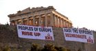 Greek protesters drape banners on Acropolis