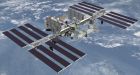 Space station's new room opened by astronauts