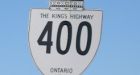 11 charged in staged collision on Highway 400