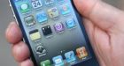 Apple blames iPhone signal loss on users