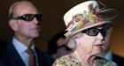 Queen dons 3-D glasses during film studio tour