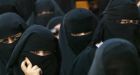 France begins burka ban debate