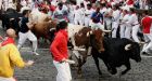 Nine injured, 3 by goring, in running of the bulls