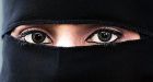 Tightened airport screening forces Muslim women to remove veils