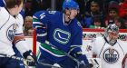 Oilers hold off Canucks