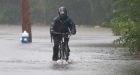 Island residents airlifted out as floodwaters rise