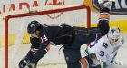 Oilers drub Canucks in Khabibulin's return