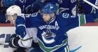 Sedins lead Canucks over Stars