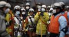 Japan suspends work at nuclear plant as radiation surges