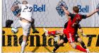 Whitecaps win MLS opener over Toronto