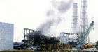 Workers pulled at Japan nuke plant as smoke rises