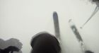 Skier survives avalanche, catches action on helmet-cam